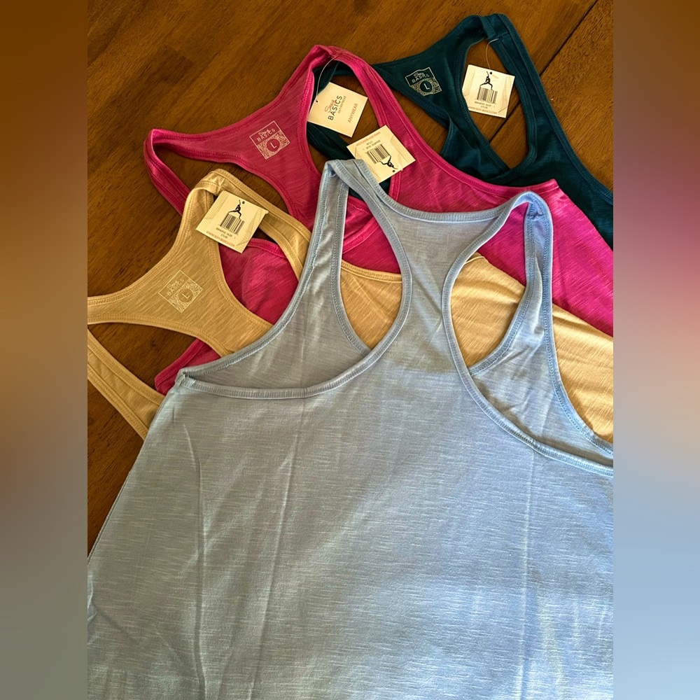 24/7 Anywhere racerback tanks.